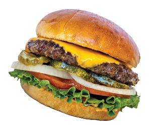A gourmet burger with a bun, crispy onion ring, one cheese-covered beef patties, pickles, lettuce, tomato, and sauce, set against a black background.