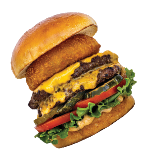 A gourmet burger with a bun, crispy onion ring, two cheese-covered beef patties, pickles, lettuce, tomato, and sauce, set against a black background.