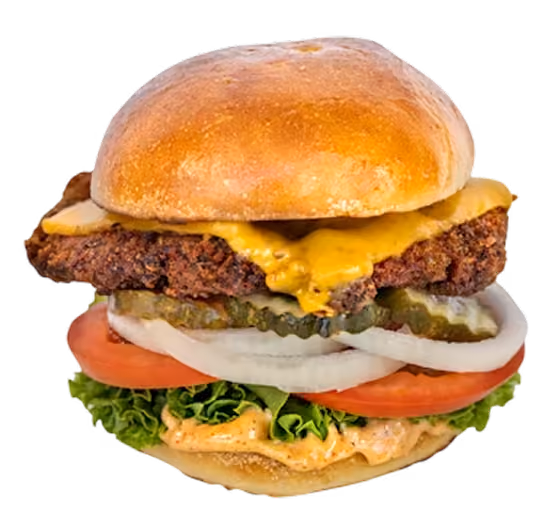 Crispy Chicken Sandwich with fresh lettuce, onions, and pickles on a custom baked bun