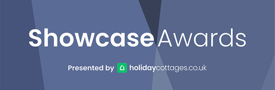 A graphic displaying the Showcase Awards, presented by holidaycottages.co.uk.