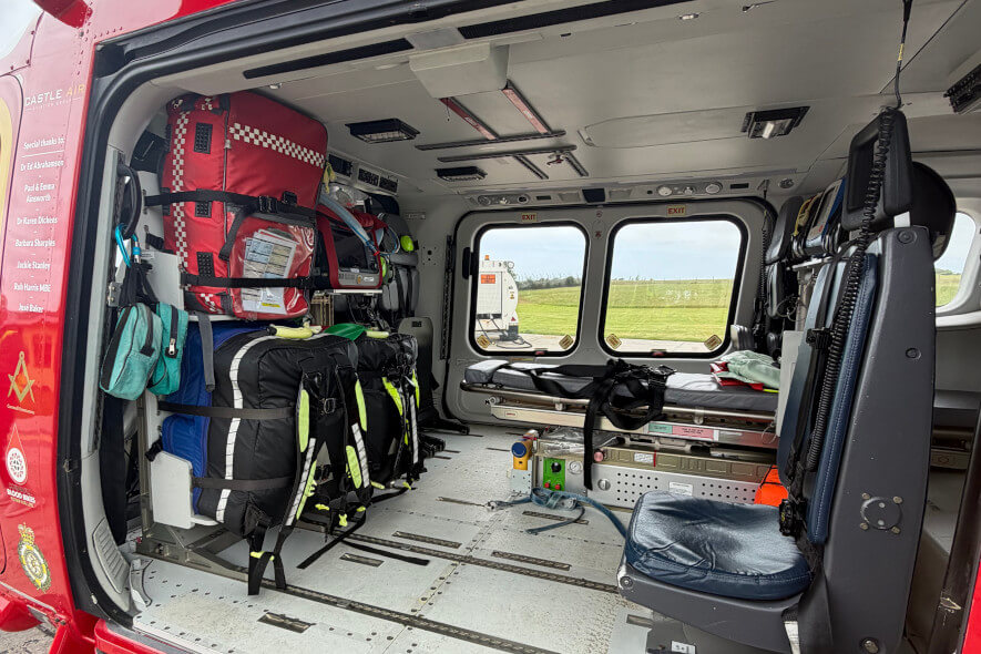 Interior of an air ambulance, showing specialist equipment and a stretcher.
