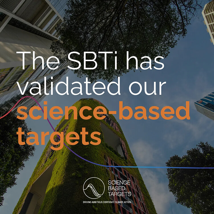 Looking up at an eco-covered building, protected by a living cocoon. Text overlaid reads, The SBTi has validated our science-based targets.