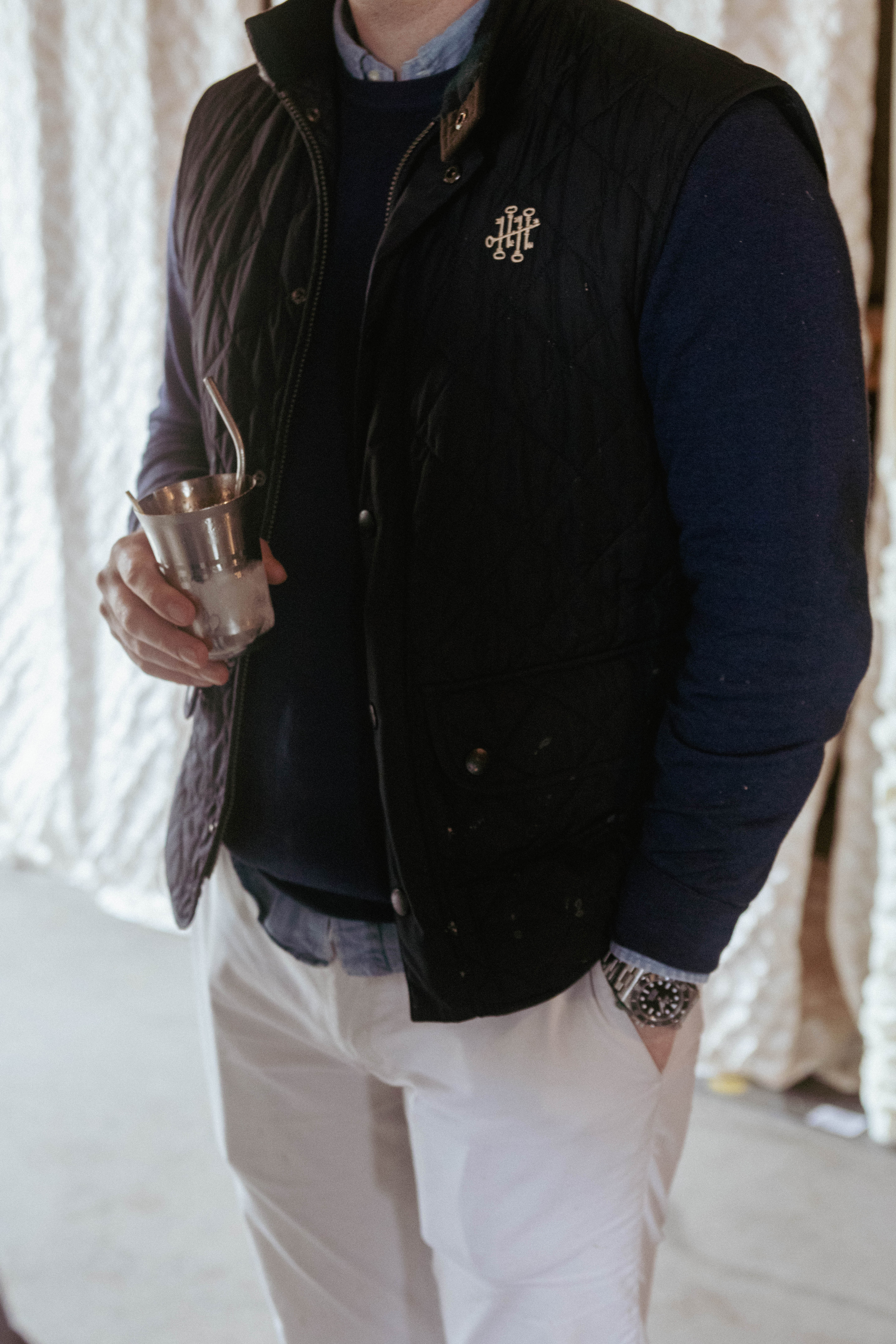 man holding cocktail