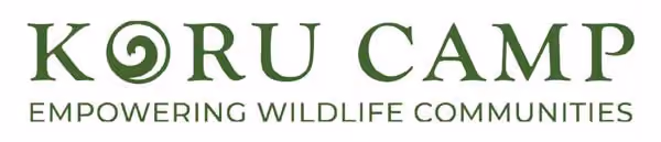 Koru Camp logo with stylized spiral in letter O and text Empowering Wildlife Communities.