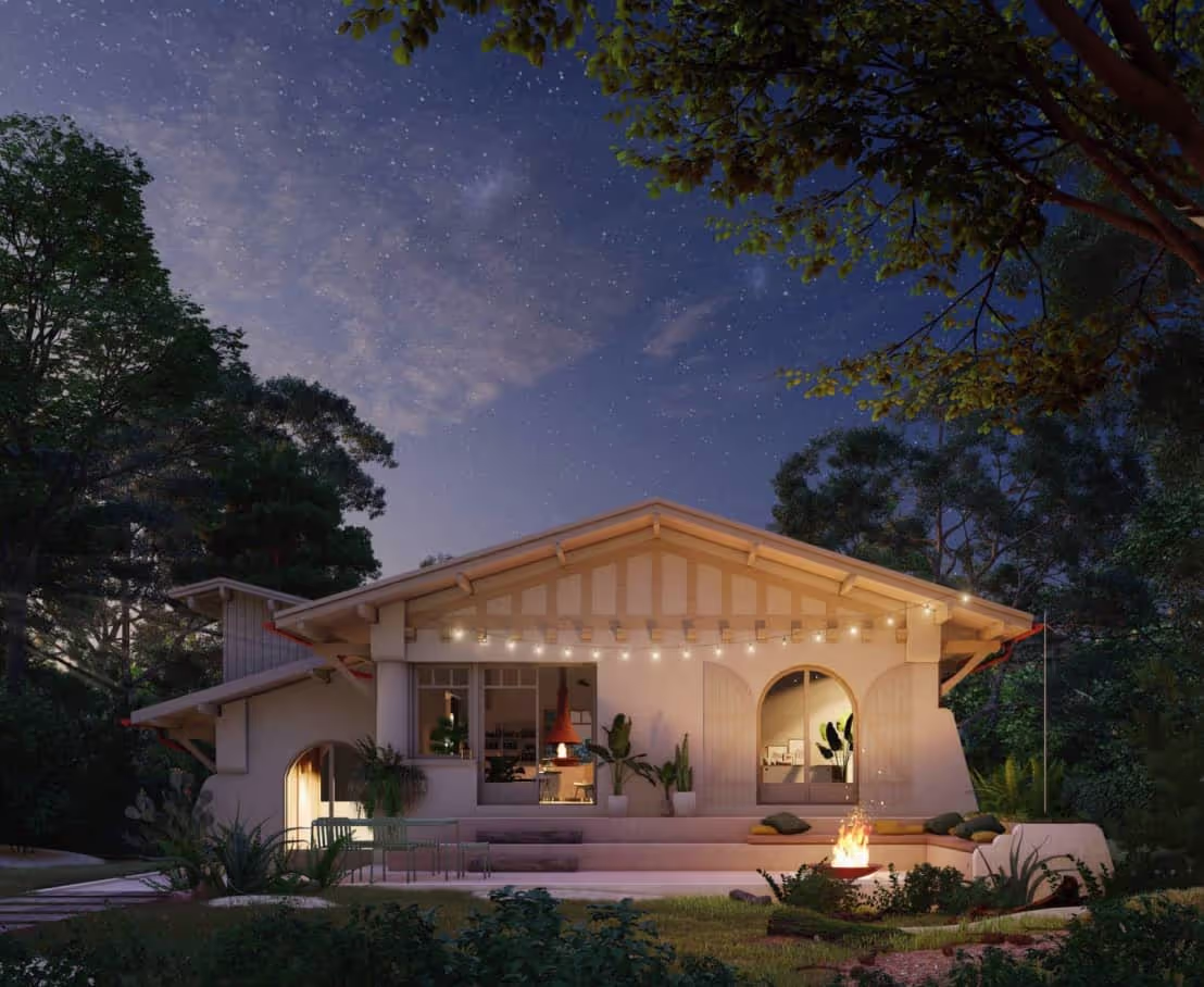 Vue de nuit d'une maison traditionnelle pylataise rénovée de façon contemporaine