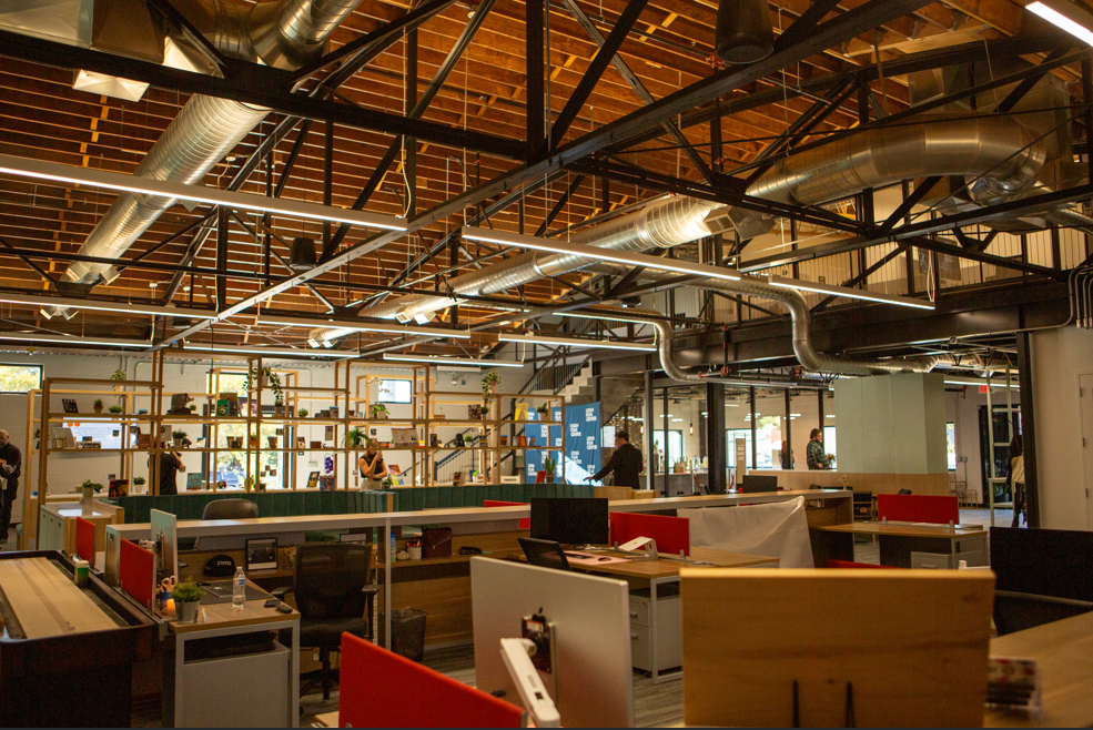 Utah Film Center coworking office space with desks and computers