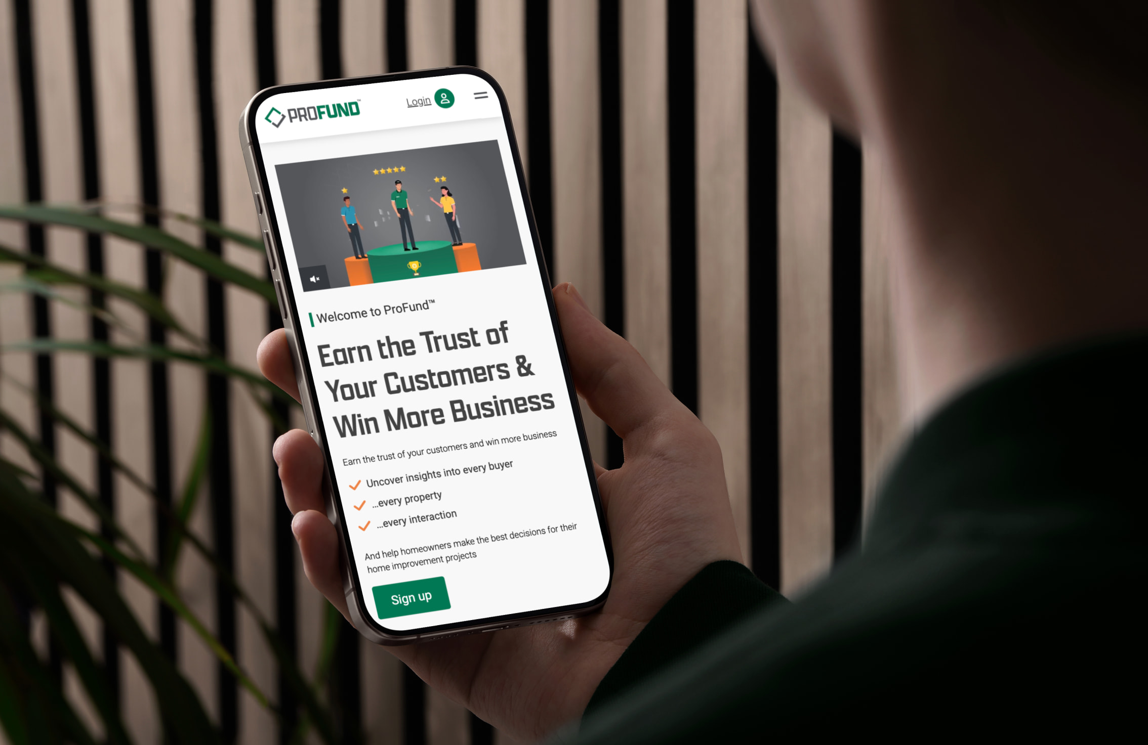A person viewing the ProFund homepage on their phone.