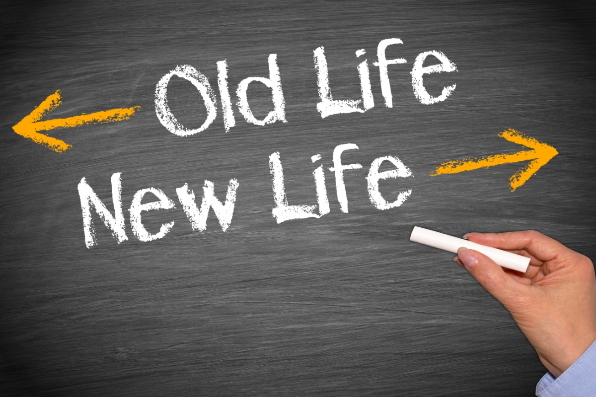 The words Old Life and New Life are written on a chalkboard.