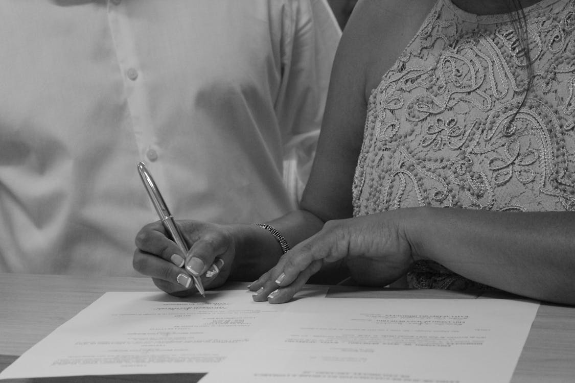 A woman filing documents for name change process
