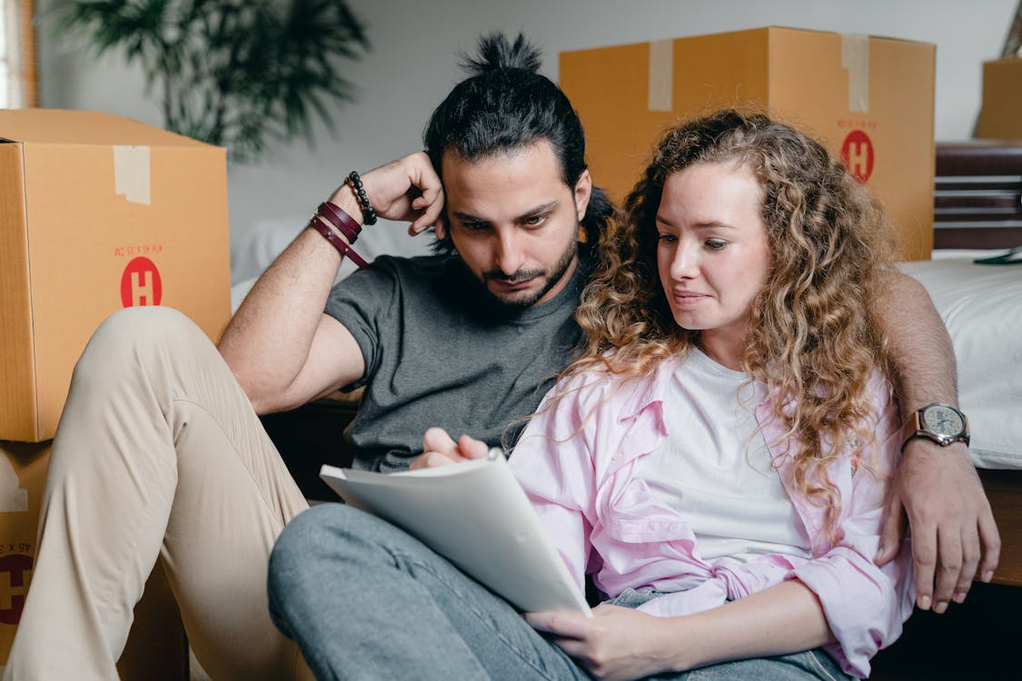 Representative image of a couple looking at the name change checklist