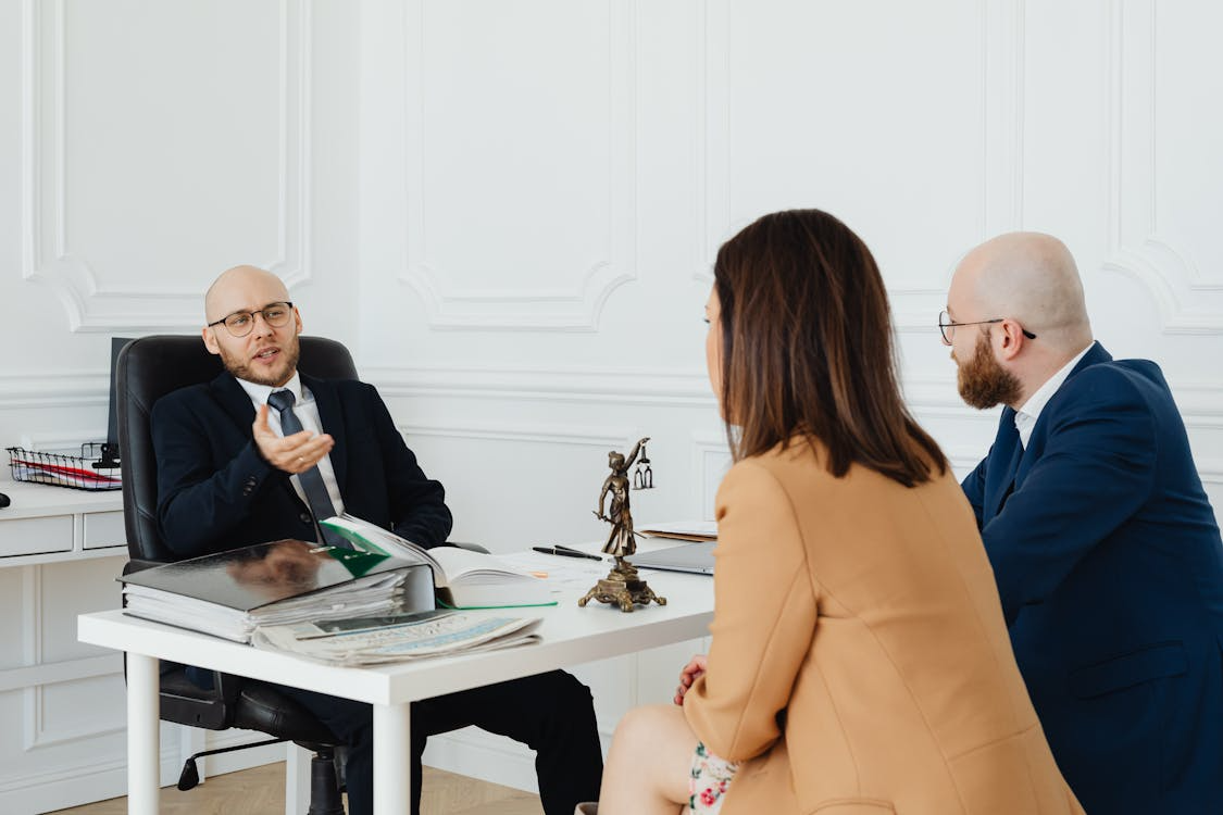 Representative image of a couple approaching an expert for name change service