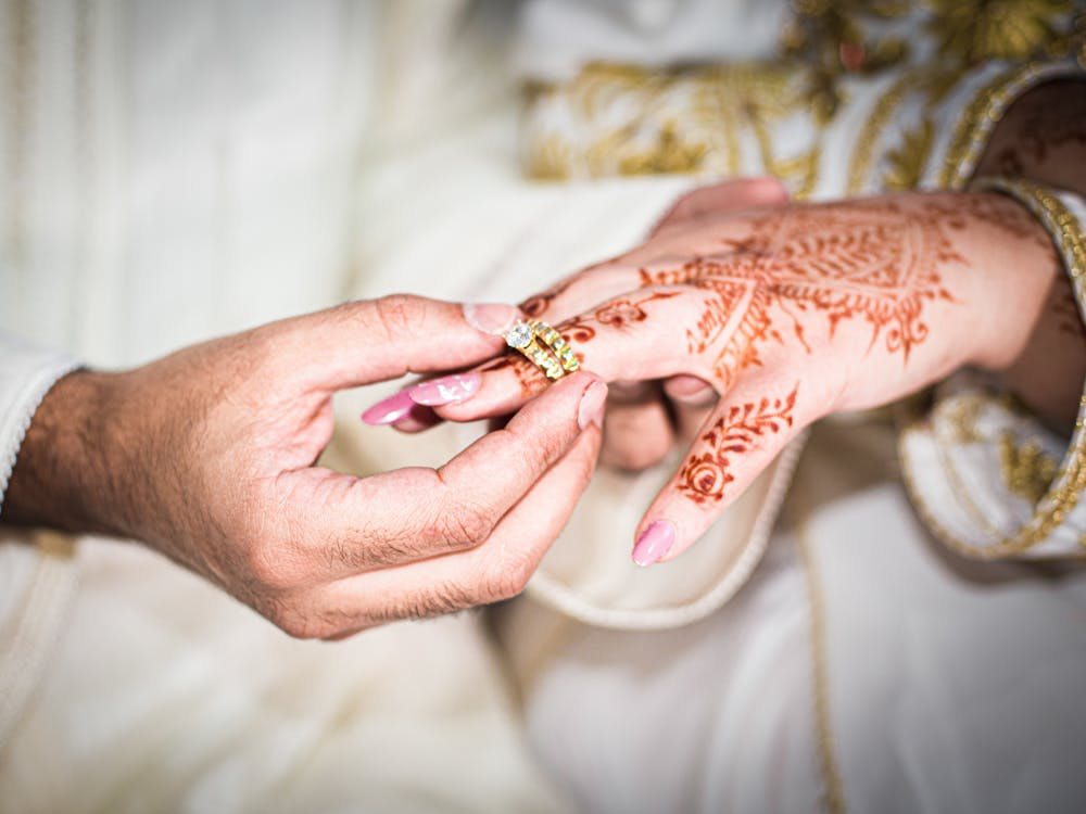 Bride and groom during Moroccan henna night, showcasing traditional wedding traditions