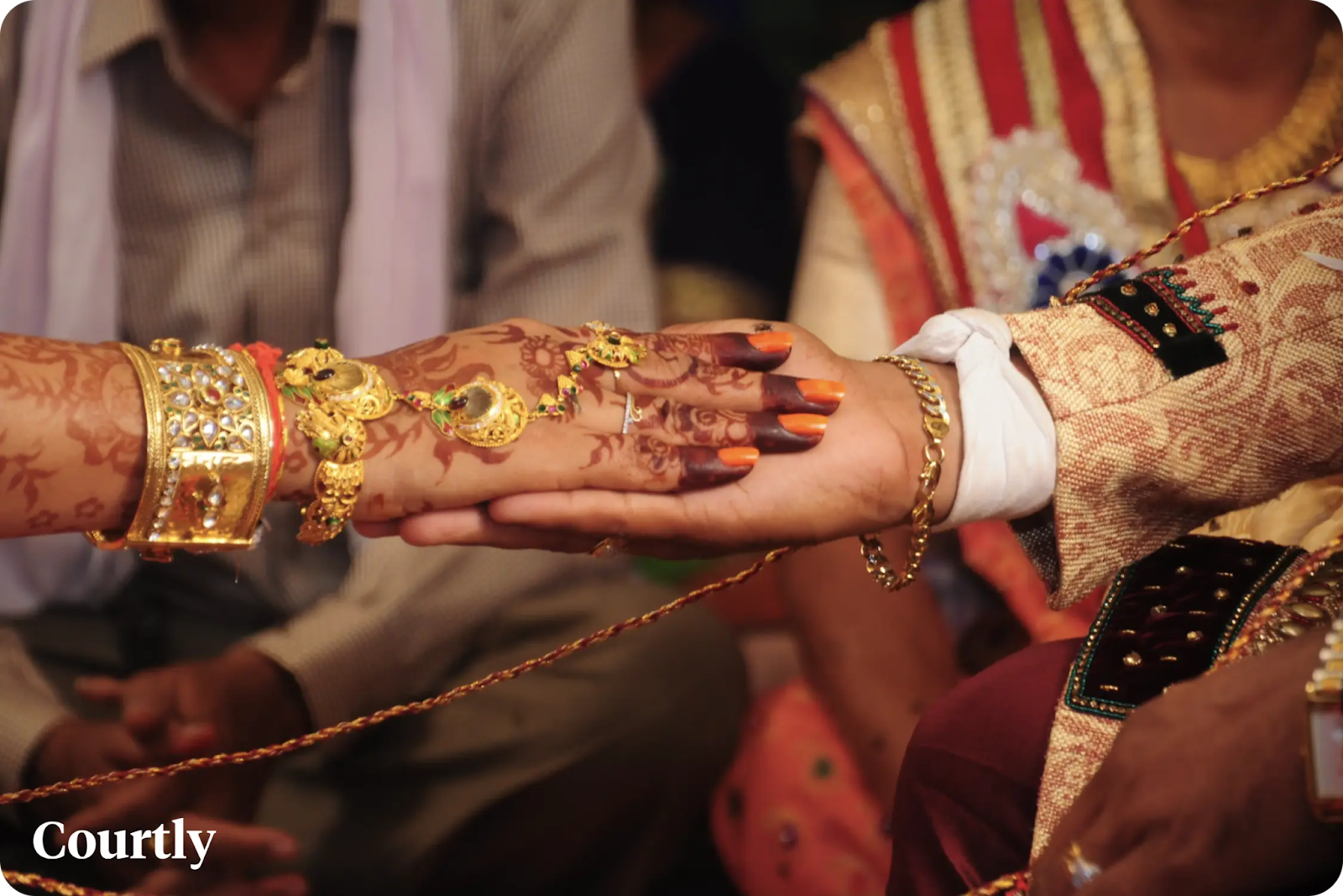 Traditional Indian wedding rituals with henna and gold jewelry reflecting unique wedding traditions