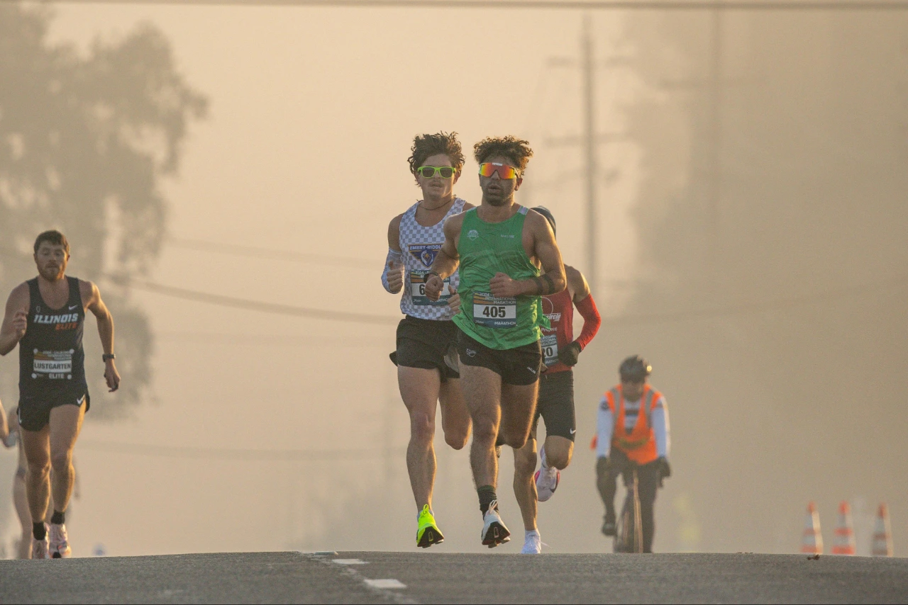 Runners racing towards the camera.