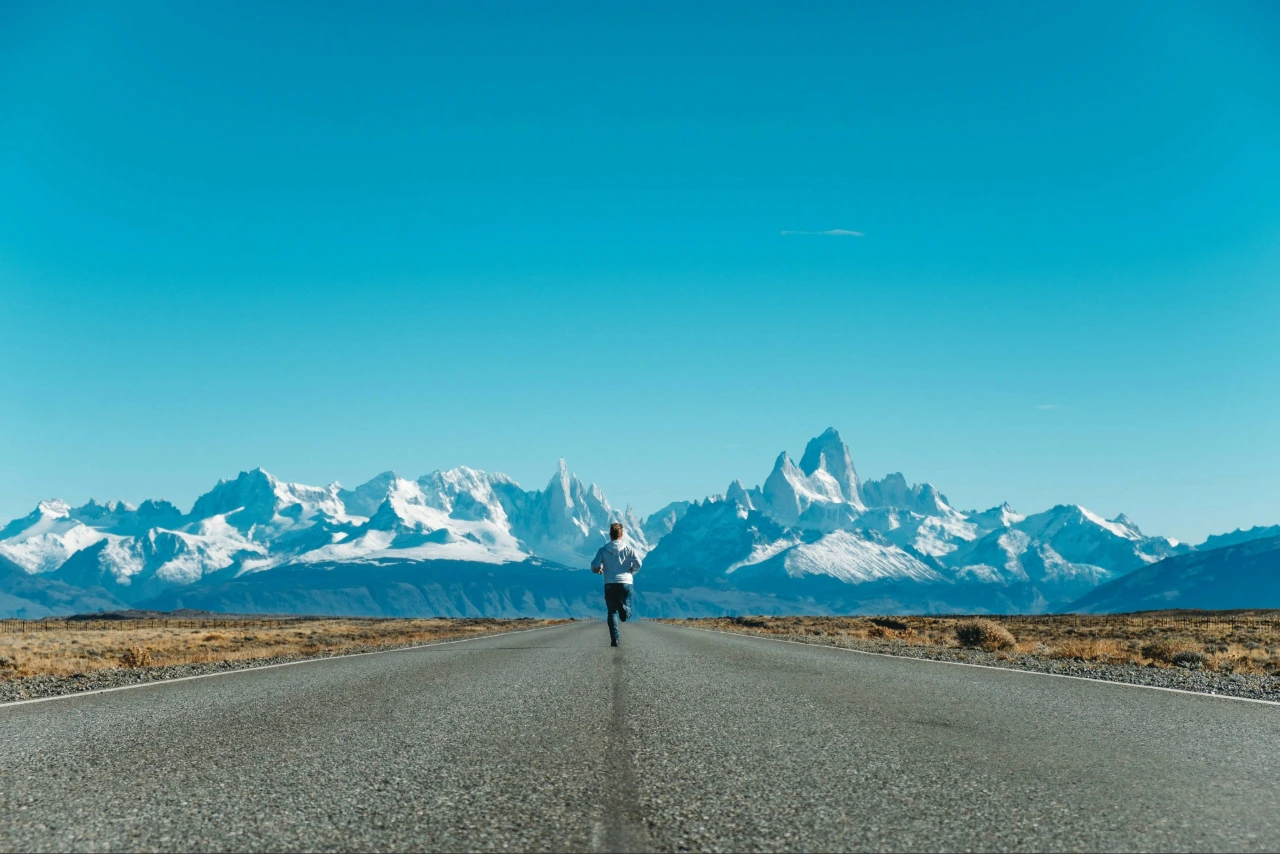 Runner with mountain scenery 