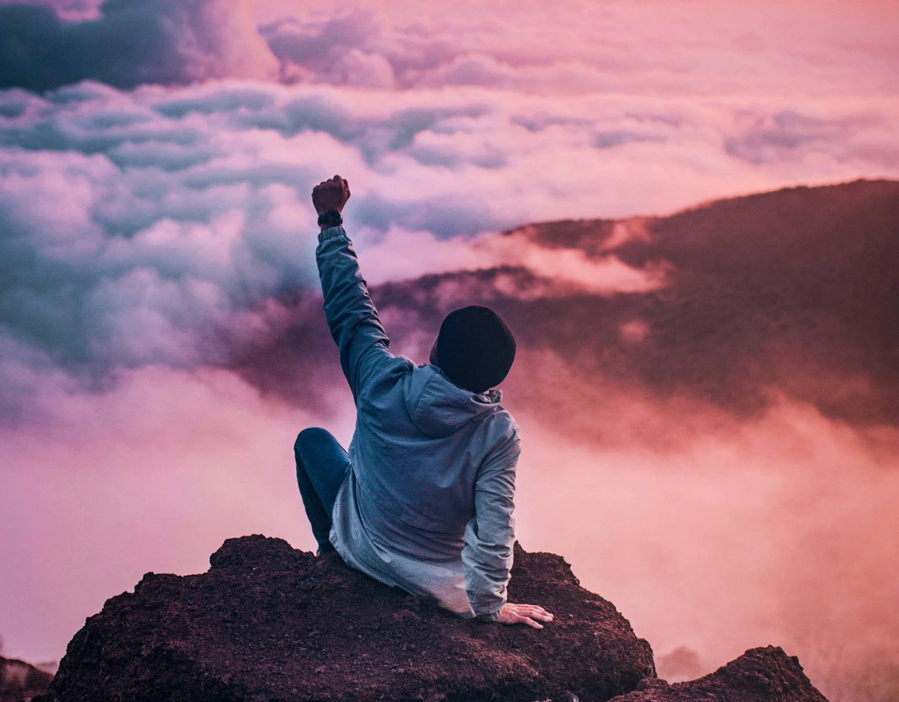 Man sitting up in the clouds.