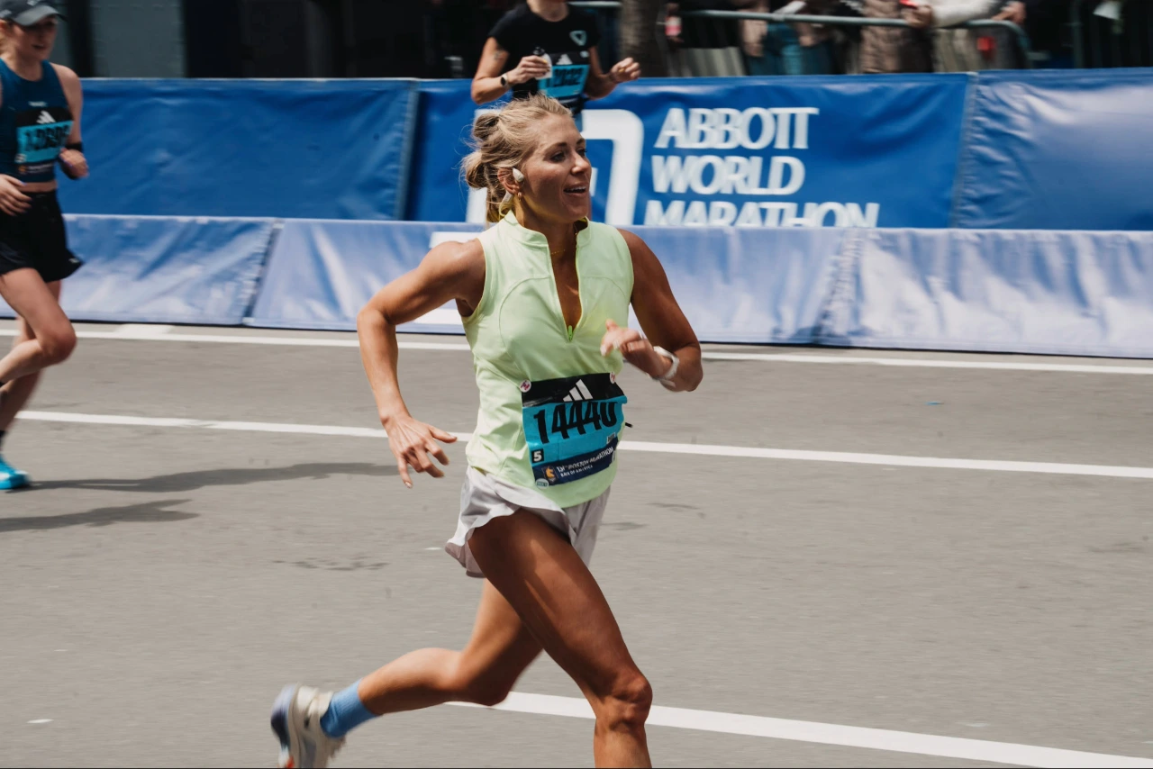 Women running with bone conduction headphones.