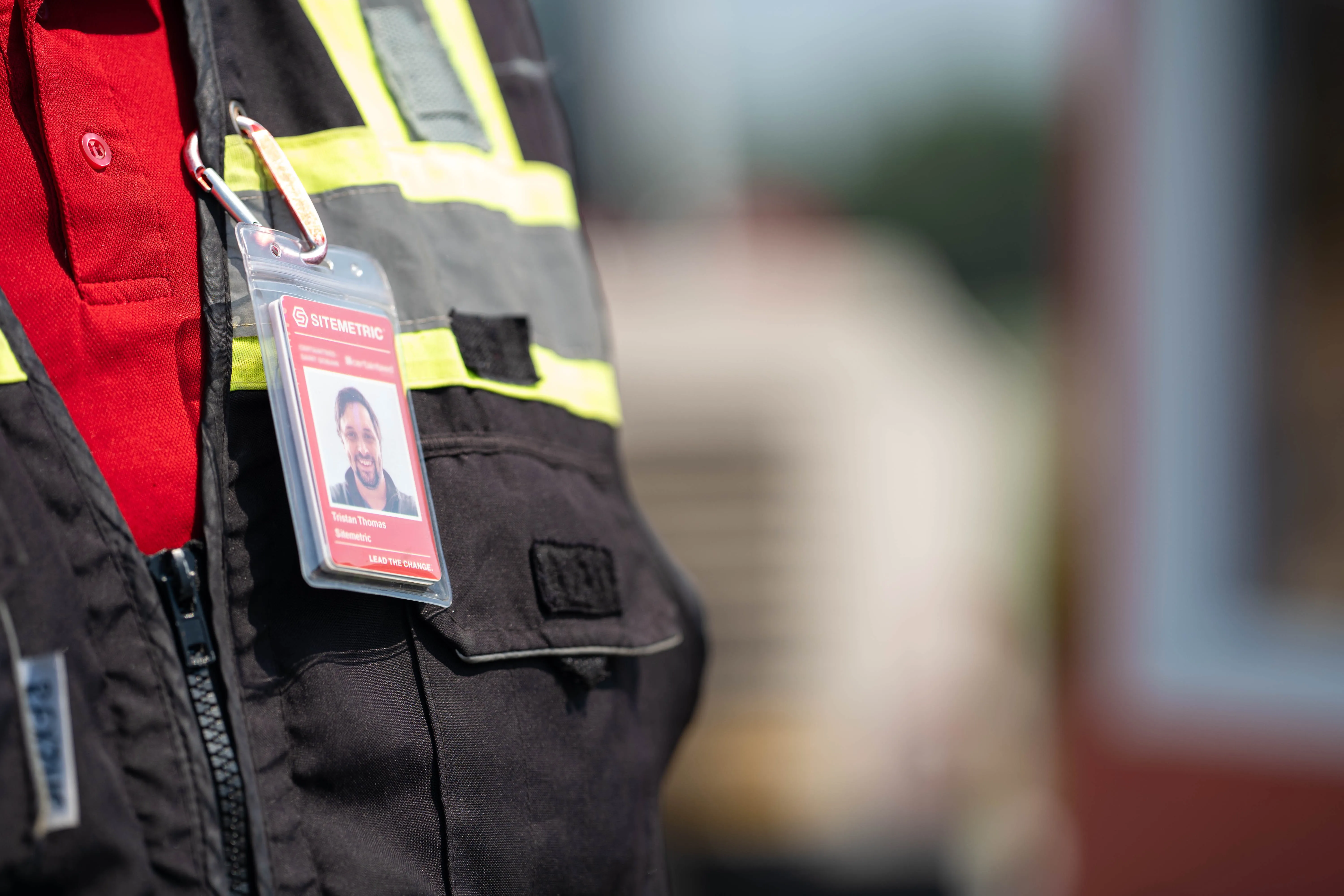 Sitemetric worker badge showing a verified worker identity and emergency contact.