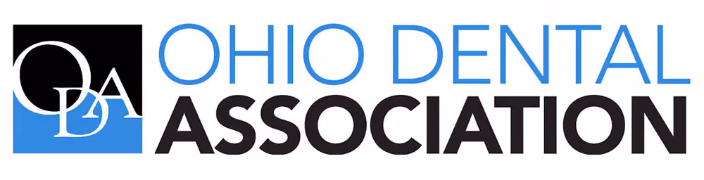 Logo with letters ODA in white overlapping on a black and blue square, next to blue text 'OHIO DENTAL' and black bold text 'ASSOCIATION'.
