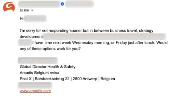 A reply from a Global Director of Health and Safety at Arcadis Belgium, offering times next Wednesday morning or Friday after lunch.