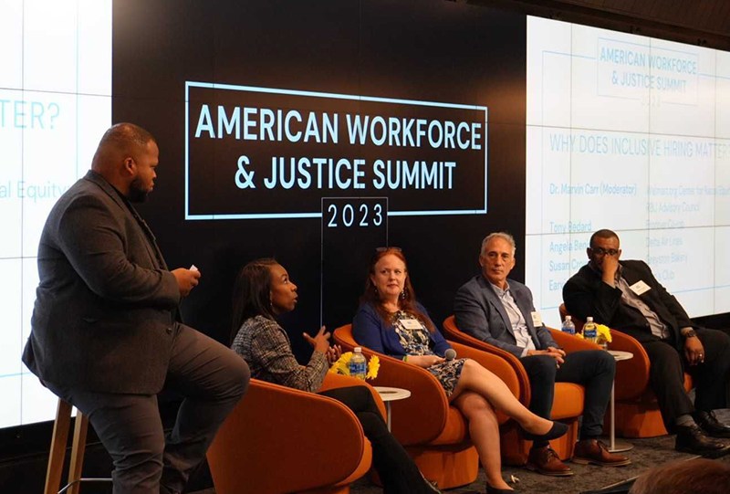 Frontier CEO and others at a summit panel