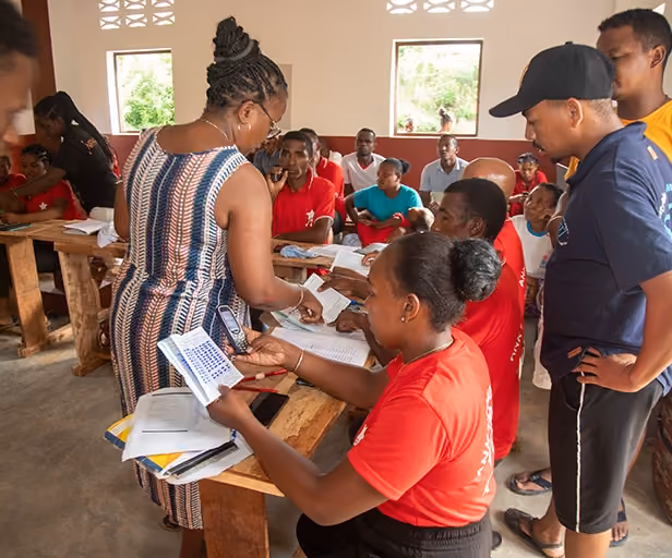 Madagascar villagers meeting to discuss savings
