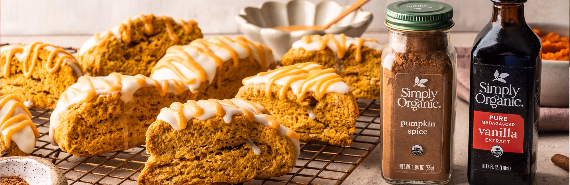 Simply Organic pumpking spice and vanilla next to scones