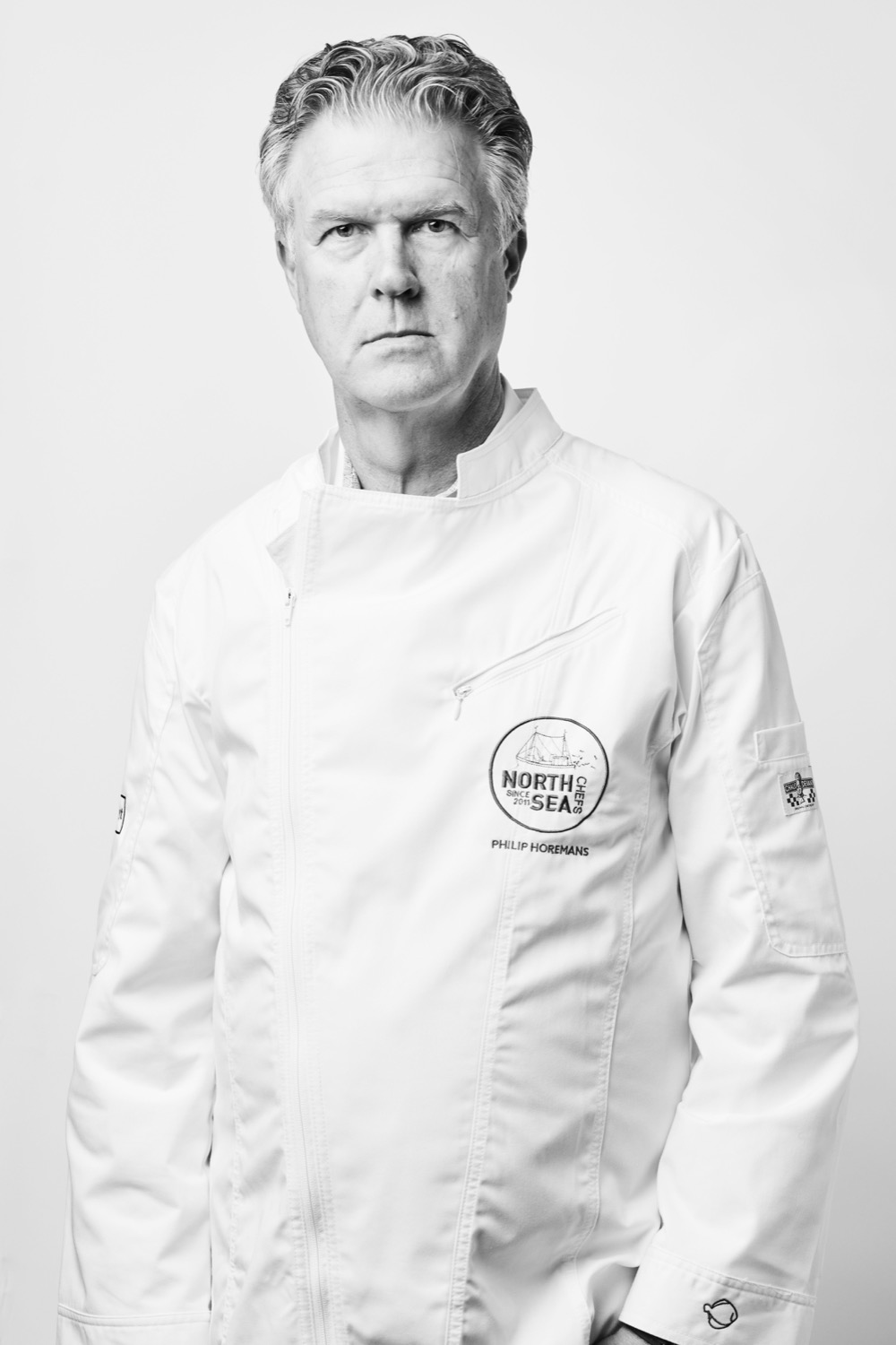 Philip Horemans in witte koksvest.