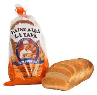 Loaf of sliced white bread next to a plastic bag labeled in Romanian with an image of a baker and wheat.