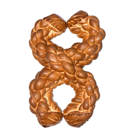 Braided bread shaped into a figure-eight on a transparent background.