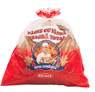 Pack of Vatra Domneasca black bread with red and white packaging and a logo featuring a baker.