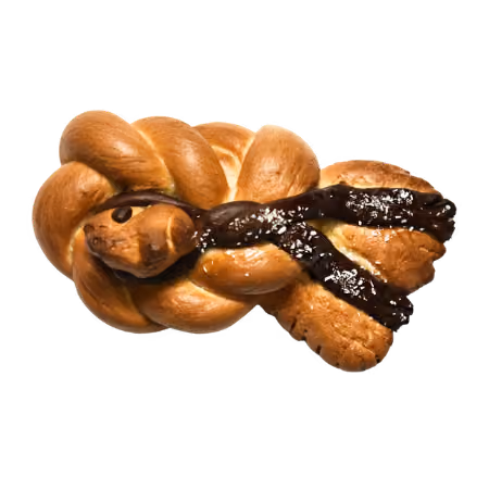 Braided bread shaped like a fish, decorated with chocolate and sprinkled with sugar.