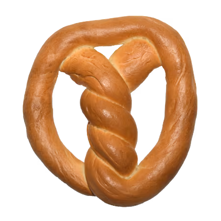 Soft baked pretzel with a twisted knot in the center on a transparent background.