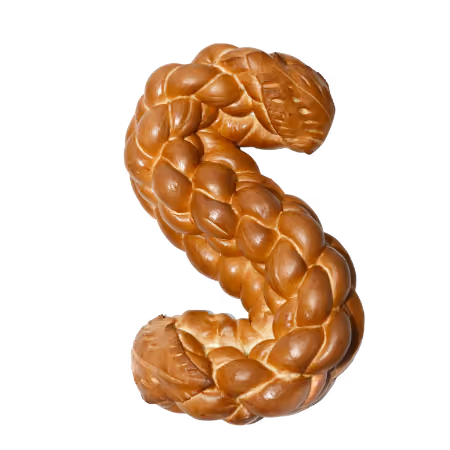 Braided bread shaped into the letter S on a white background.