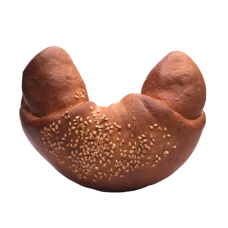 Crescent-shaped bread roll topped with sesame seeds on a white background.