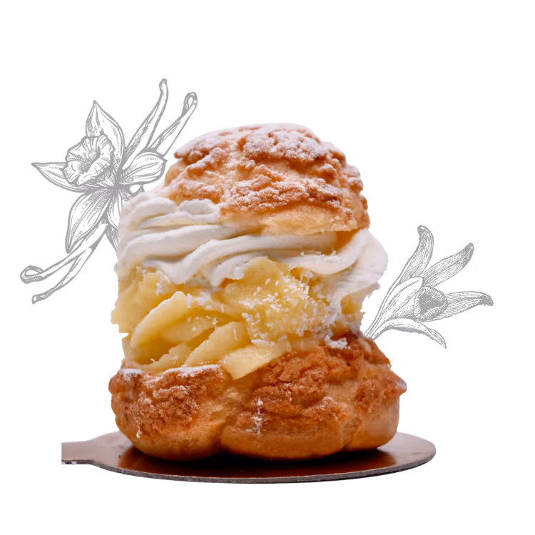Cream puff pastry filled with whipped cream and sliced fruit, dusted with powdered sugar.