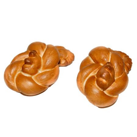Two golden-brown knotted bread rolls with a glossy crust on a white background.