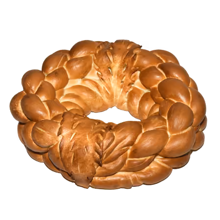 Round braided bread wreath with a golden-brown crust.