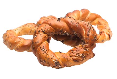Two twisted bread rings topped with poppy seeds and coarse salt on a white background.