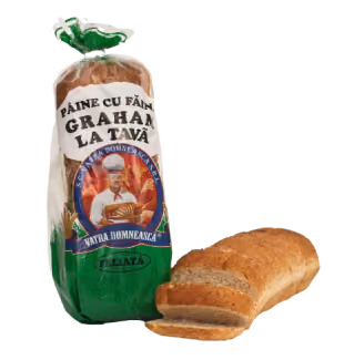 Packaged loaf of Graham bread with two sliced pieces in front.