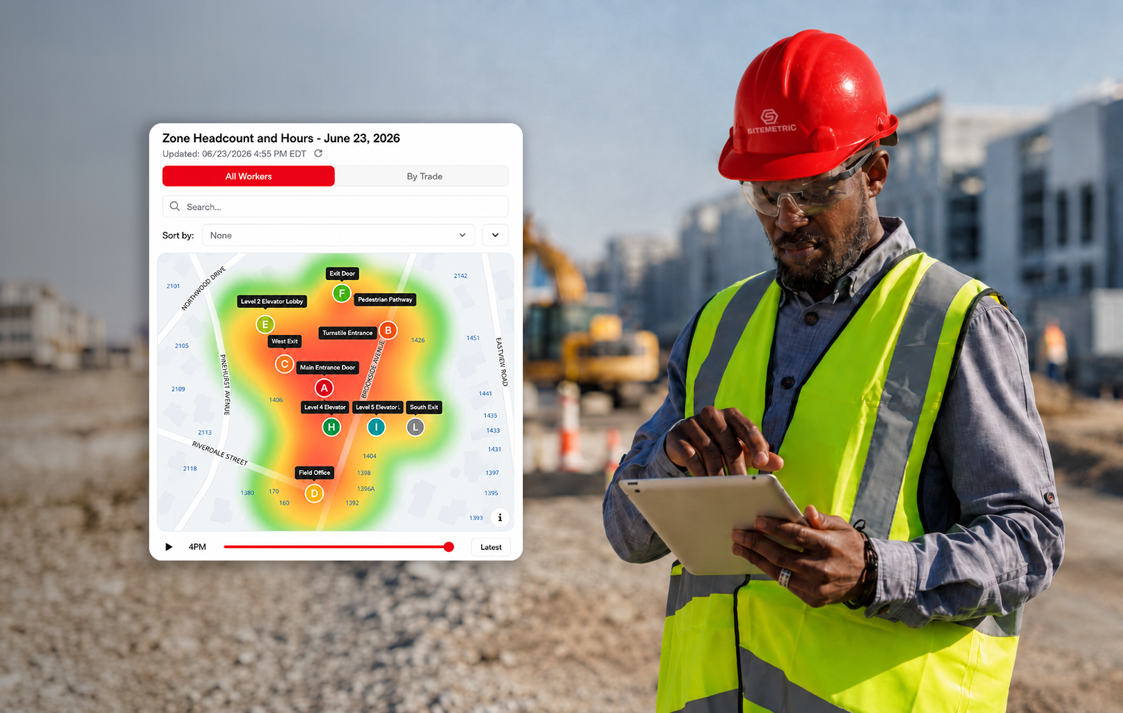 Construction worker viewing the Zone Intelligence live workforce heat map in the Sitemetric app on a tablet at an active construction site.