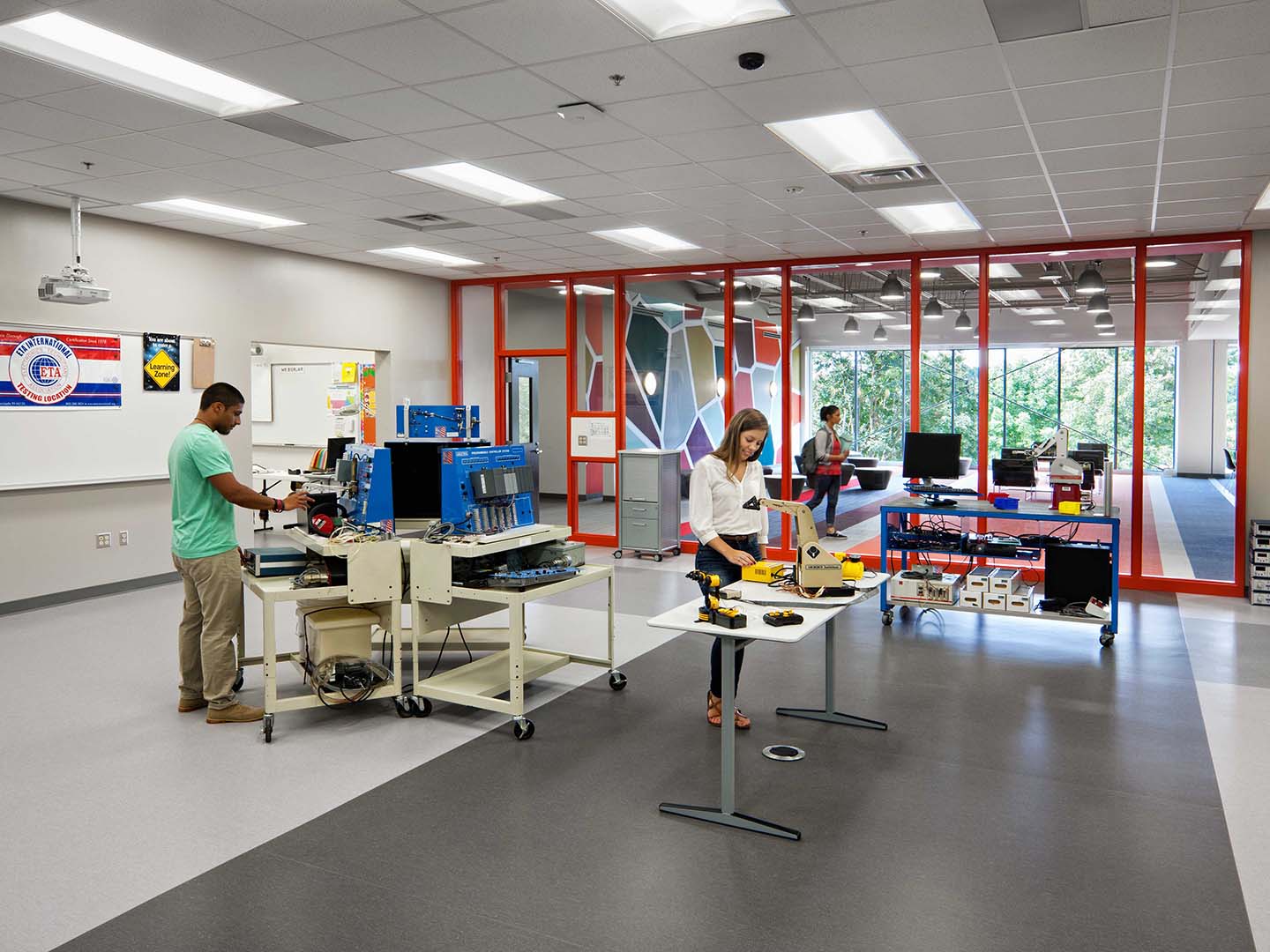 A photo of students in a robotics classroom.