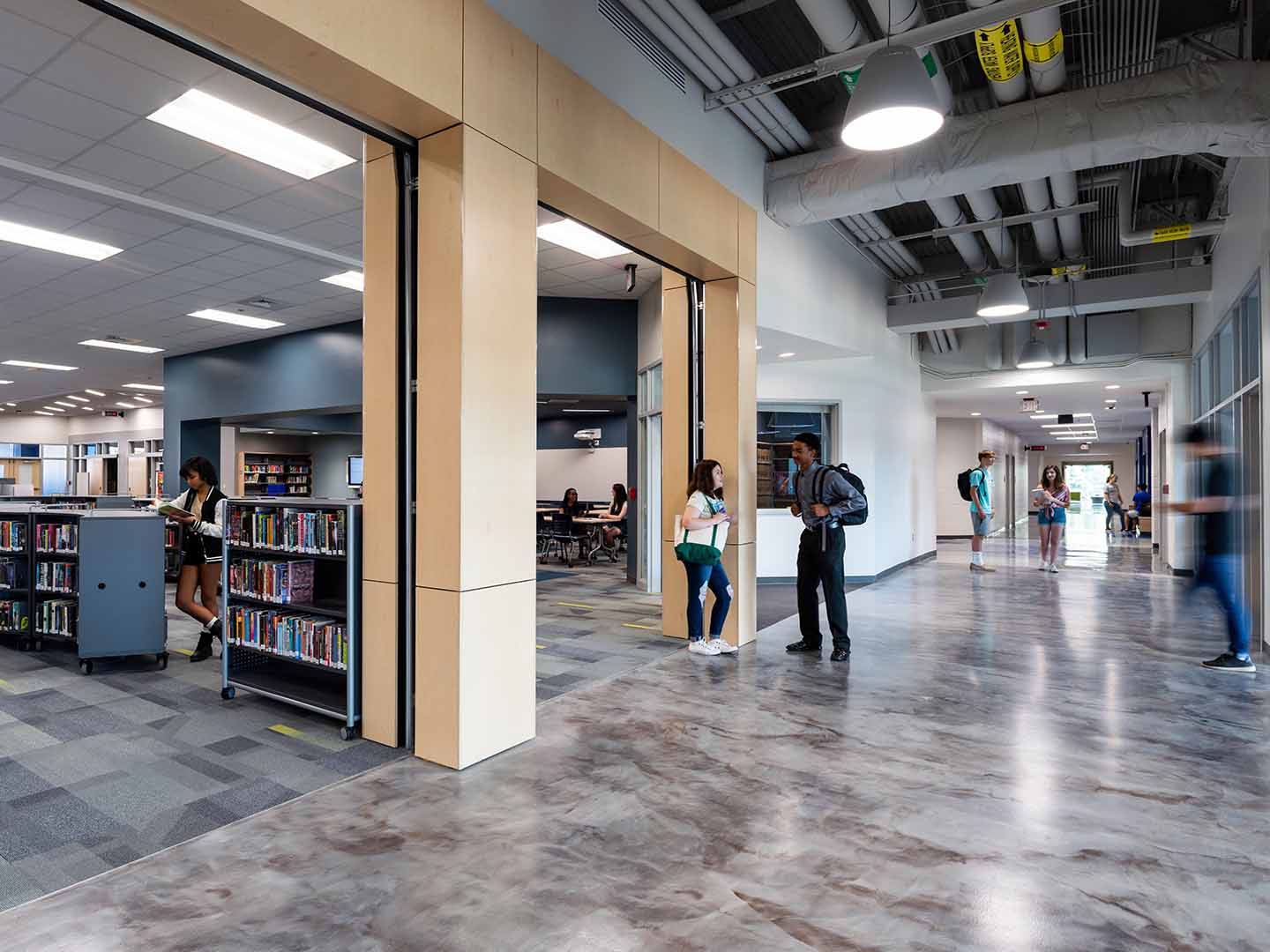 A photo of the newly improved, open and spacious, court-like learning commons.