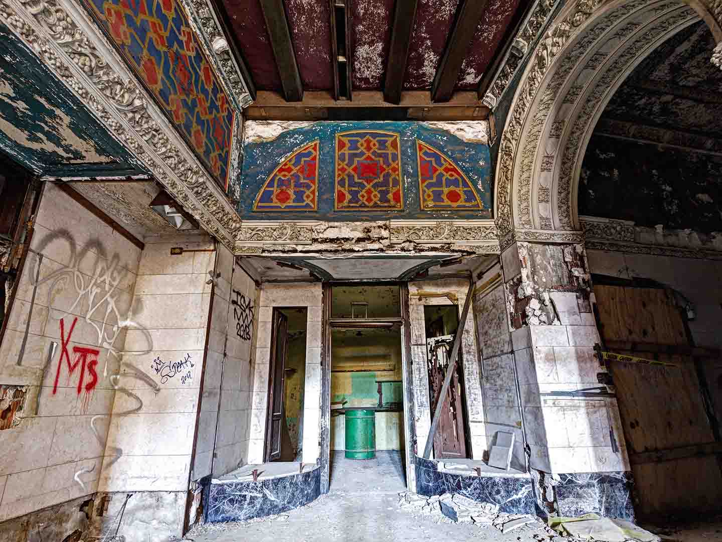 Photo of rundown building interior.
