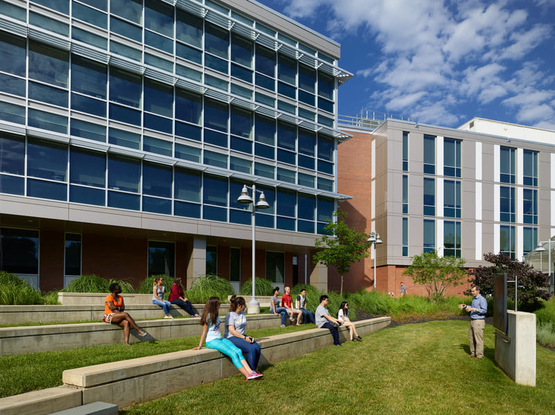 A photo of students in a courtyard.