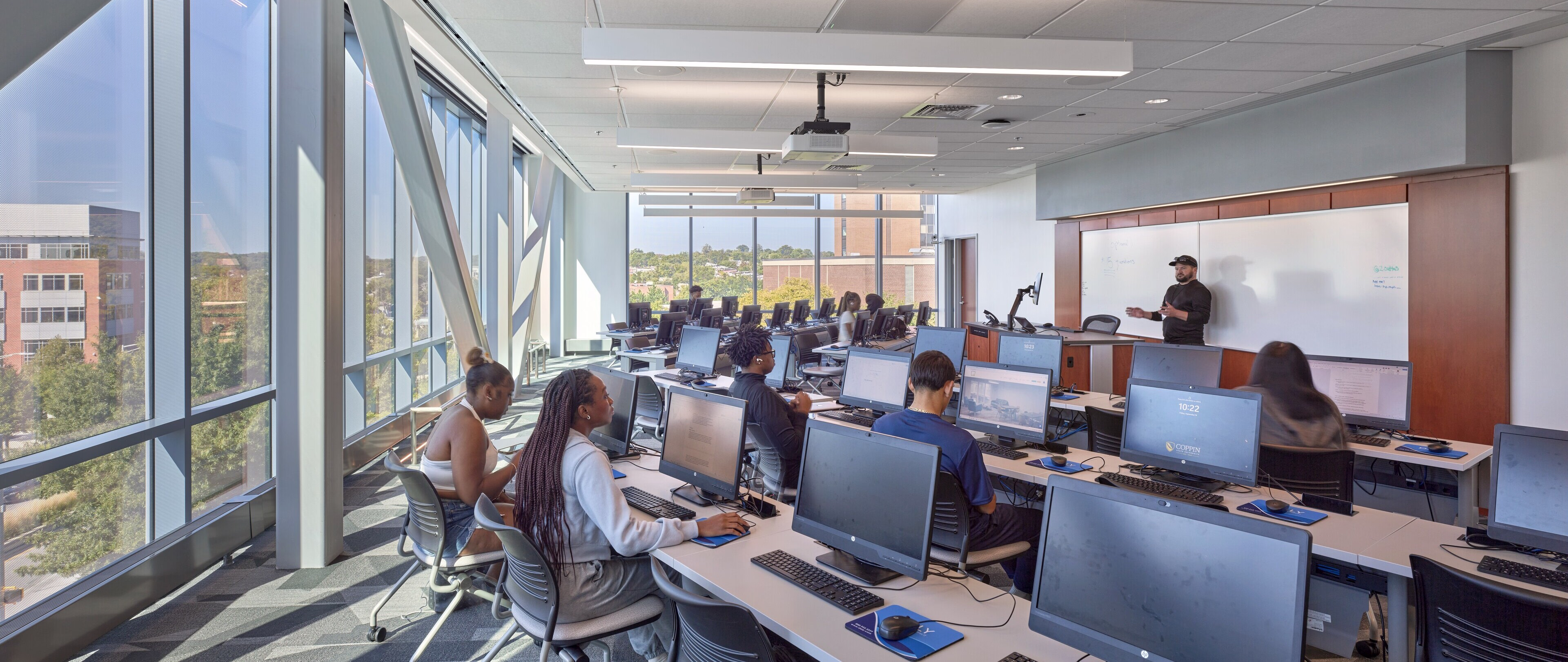 Students use the computer lab during class.