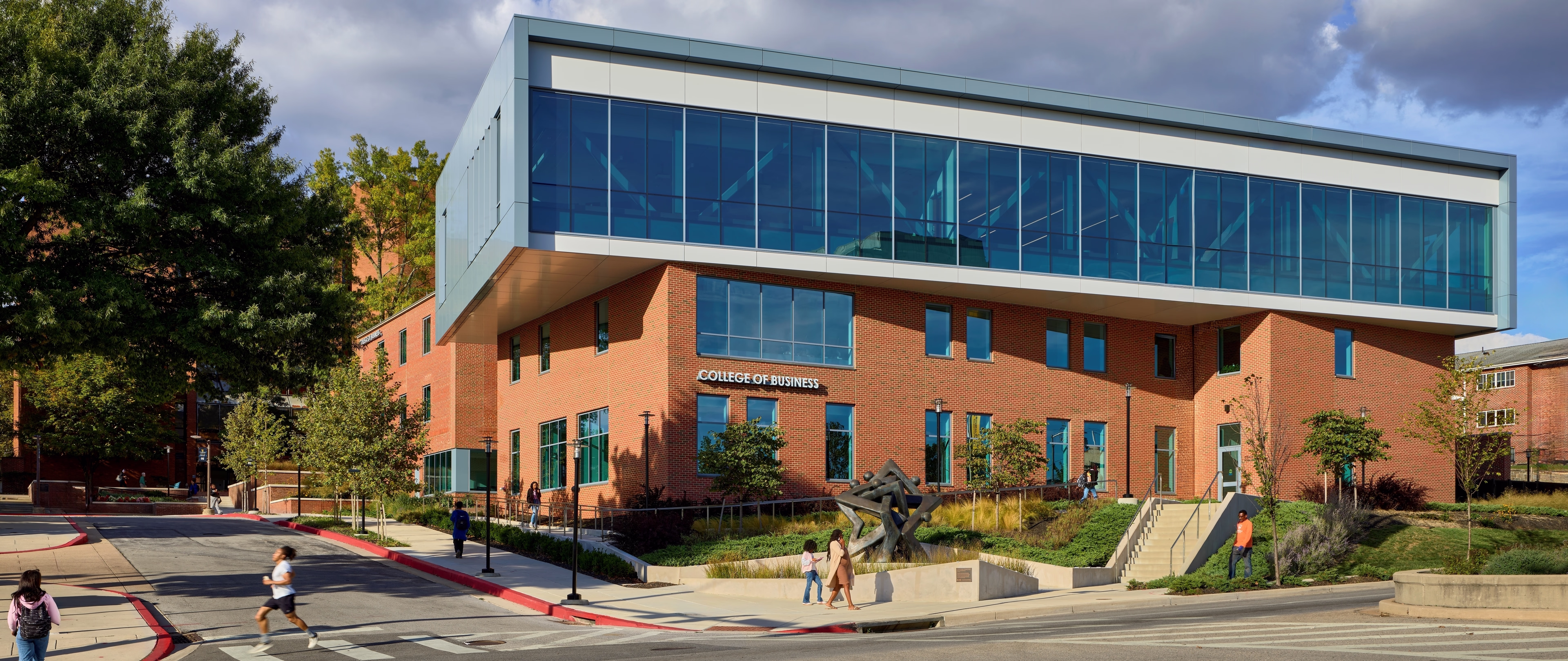 Exterior of the College of Business at Coppin State University during the day.