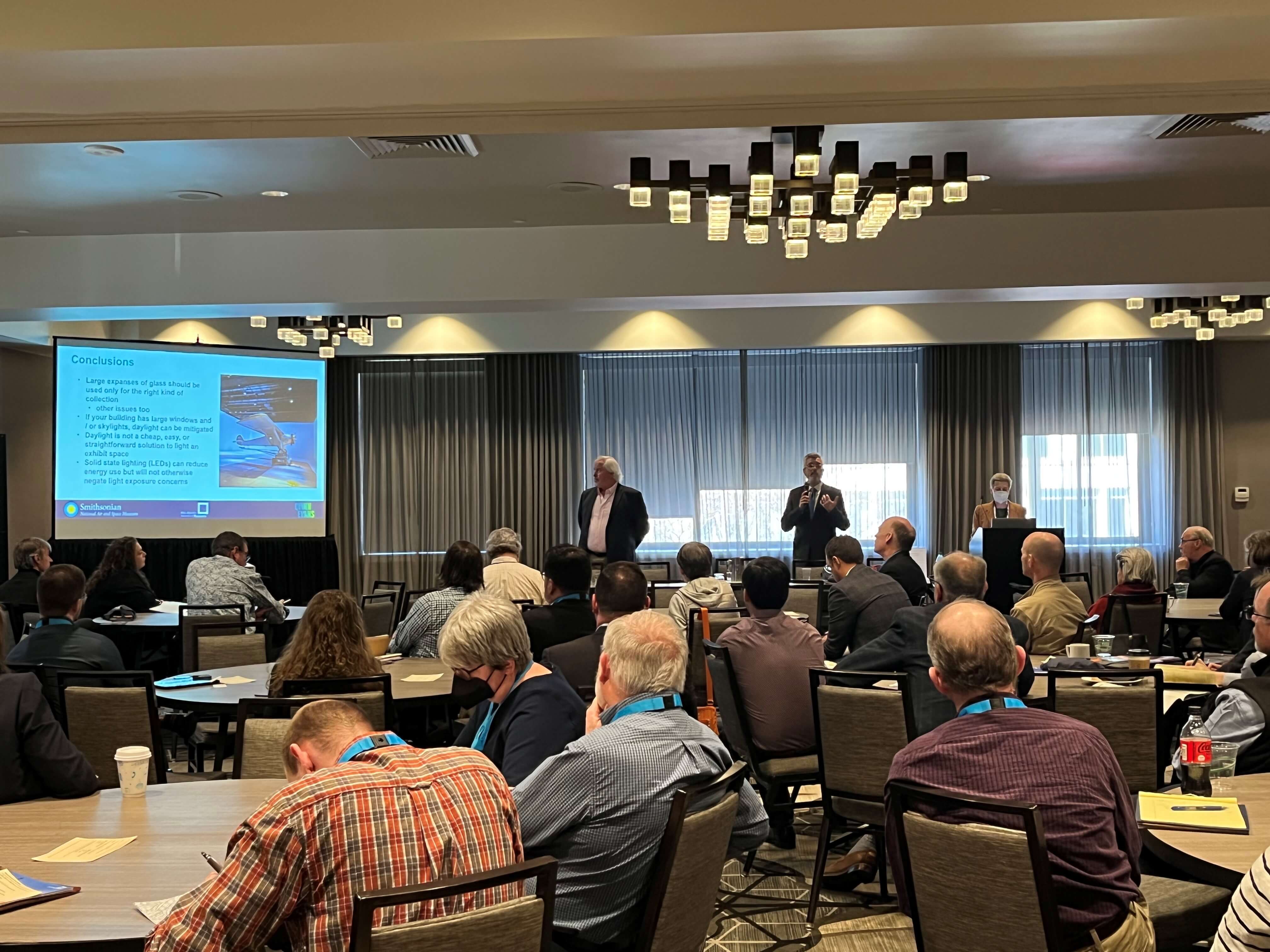A photo of Leora Mirvish, Michael Henry, and Gary Woodall presenting at the 2022 Building Museums Symposium.