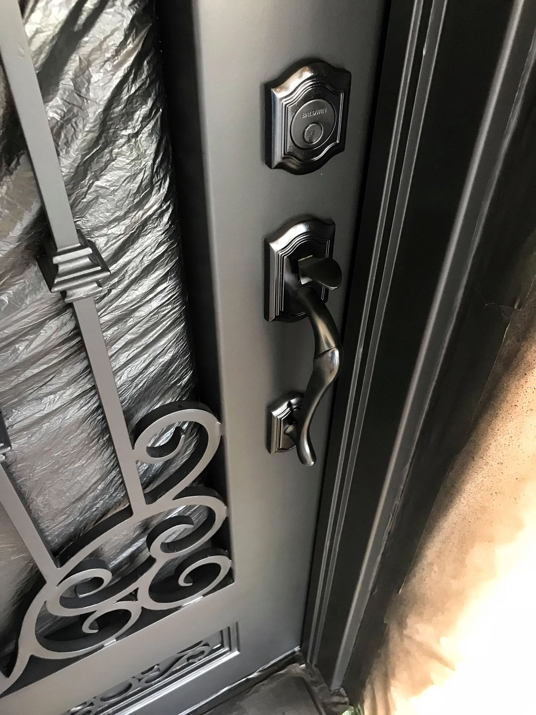 Fantasy Finishes Long Island, NY. Wrought Iron Entryway.