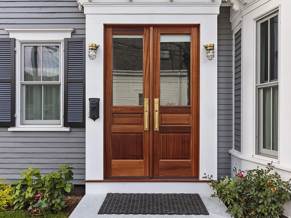 How do you repair outdated hardware and refinish an entryway?